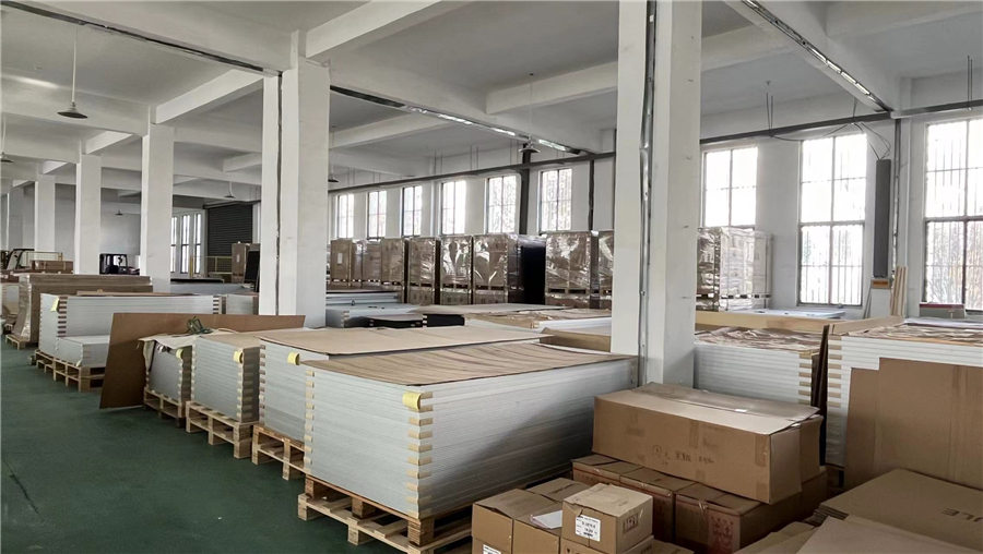 Palletized solar panels in a warehouse